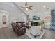 Cozy living room featuring vaulted ceilings, a fireplace, and plenty of comfortable seating at 2755 Turning Leaf Dr, Lawrenceville, GA 30044