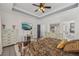 Bedroom with a view of the ensuite bathroom, neutral tones, and bright natural light at 2755 Turning Leaf Dr, Lawrenceville, GA 30044