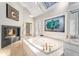 Main bathroom featuring a fireplace, jacuzzi bathtub, stained glass window, and marble countertop at 5930 N Eton Ct, Duluth, GA 30097