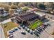 View of Roswell Junction featuring outdoor seating, landscaping and ample parking at 1545 Heritage Trl, Roswell, GA 30075