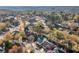 Scenic aerial view of the neighborhood, surrounded by lush trees and charming homes at 1545 Heritage Trl, Roswell, GA 30075