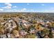 Wide aerial perspective of neighborhood showcasing proximity to nearby shopping and dining at 1545 Heritage Trl, Roswell, GA 30075