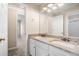 Bathroom showcasing dual sinks with granite counters at 1545 Heritage Trl, Roswell, GA 30075
