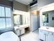 Primary bathroom with soaking tub, separate vanities, and walk-in shower at 1545 Heritage Trl, Roswell, GA 30075
