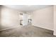 Bedroom featuring carpet and an open doorway to hallway at 1545 Heritage Trl, Roswell, GA 30075