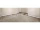 Large bonus room with carpet and neutral color walls featuring a door leading to the upstairs at 1545 Heritage Trl, Roswell, GA 30075