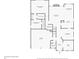 Detailed first floor plan featuring a spacious layout with a kitchen, living room, and primary bedroom at 1545 Heritage Trl, Roswell, GA 30075