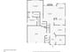 First floor plan showing layout of living spaces, bedrooms, and garage at 1545 Heritage Trl, Roswell, GA 30075