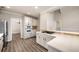 Modern kitchen with stainless steel appliances, granite countertops, and eat-in bar at 1545 Heritage Trl, Roswell, GA 30075