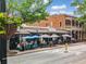 Charming street view with pedestrian-friendly sidewalks, outdoor seating, and landscaping at 1545 Heritage Trl, Roswell, GA 30075