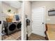 Well-equipped laundry room with modern washer and dryer at 188 Harmony Woods Dr, Dallas, GA 30157