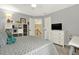 Cozy bedroom with open shelving, and a ceiling fan at 492 Broadstone Nw Way, Acworth, GA 30101