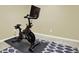 Well-equipped exercise area with a modern exercise bike and workout mat at 492 Broadstone Nw Way, Acworth, GA 30101