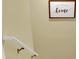 Hallway with a staircase featuring a decorative sign at 492 Broadstone Nw Way, Acworth, GA 30101