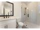 Modern bathroom features marble countertop, sleek fixtures, and a glass-enclosed shower at 5238 Timber Ridge Rd, Marietta, GA 30068