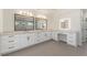 Bright bathroom featuring double vanity with quartz countertop and bronze fixtures at 5238 Timber Ridge Rd, Marietta, GA 30068