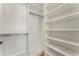 Spacious walk-in closet with custom shelving and ample storage space at 5238 Timber Ridge Rd, Marietta, GA 30068