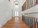 Grand foyer with high ceilings, chandelier, hardwood floors, and a striking staircase at 5238 Timber Ridge Rd, Marietta, GA 30068