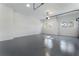 Spacious garage with painted floors, providing ample room for parking and storage at 5238 Timber Ridge Rd, Marietta, GA 30068