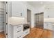 This kitchen features custom cabinets, stainless steel appliances, and hardwood floors at 5238 Timber Ridge Rd, Marietta, GA 30068