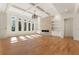 Spacious living room featuring built-in shelving, a fireplace, and coffered ceilings at 5238 Timber Ridge Rd, Marietta, GA 30068