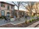 Exterior shot of courtyard with a concrete firepit and green chairs at 170 Boulevard Se # 111H, Atlanta, GA 30312