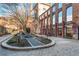 Exterior view of outdoor seating area and historic building at 170 Boulevard Se # 111H, Atlanta, GA 30312