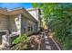 Exterior view of a house with an air conditioning unit and a stone pathway at 2700 Pine Tree Ne Rd # 3010, Atlanta, GA 30324