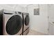 Bright laundry room with modern washer and dryer machines at 2700 Pine Tree Ne Rd # 3010, Atlanta, GA 30324