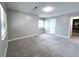 Bright bedroom with wall-to-wall carpet, neutral colors, and natural lighting at 3020 Wingate Way, Sandy Springs, GA 30350