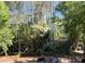 A natural wooded back area in a tranquil community; assigned parking visible at 3020 Wingate Way, Sandy Springs, GA 30350