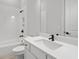 Clean bathroom featuring white cabinets, quartz counters, and a shower with glass door at 320 Gray Shingle Ln, Woodstock, GA 30189