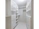 Walk-in closet offers ample storage with built-in shelves and drawers at 335 W Ponce De Leon Ave # 506, Decatur, GA 30030