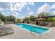 Relaxing pool area with lounge chairs and beautiful pergola shading at 335 W Ponce De Leon Ave # 506, Decatur, GA 30030