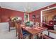 Warm dining room showcasing traditional furniture, buffet, and inviting decor at 3640 Shelby Ln, Marietta, GA 30062