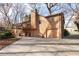 Side exterior elevation showcasing deck and covered patio with a multi-car driveway at 3640 Shelby Ln, Marietta, GA 30062