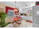 Bright kitchen nook with white cabinets, breakfast table, and garden view at 3640 Shelby Ln, Marietta, GA 30062