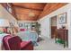 Bright main bedroom featuring wood-paneled vaulted ceilings and a comfortable seating area at 3640 Shelby Ln, Marietta, GA 30062