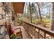 Cozy porch featuring rocking chairs, decorative flower boxes, and a view of the serene, tree-lined neighborhood at 3640 Shelby Ln, Marietta, GA 30062