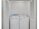 White laundry closet featuring side by side washer and dryer at 4169 Cedar Valley Ln, Conley, GA 30288