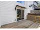 Wooden back deck with white siding and black awning at 190 Clydesdale Se Ln, Mableton, GA 30126