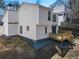 Picture of a two-story home showcasing the wooden deck, side yard, and white siding, with blue stone around the base at 190 Clydesdale Se Ln, Mableton, GA 30126