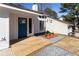 Bright and airy front porch with new landscaping leads to the front door of the house at 190 Clydesdale Se Ln, Mableton, GA 30126