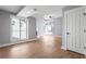 Living room featuring many windows, a fireplace, luxury floors, and recessed lighting at 190 Clydesdale Se Ln, Mableton, GA 30126