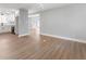 Living Room and Kitchen with stainless steel appliances, granite countertops, and hardwood floors at 190 Clydesdale Se Ln, Mableton, GA 30126