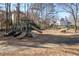 Community playground with slides, climbing structures, swings, and benches for parents at 2038 Cresthaven Walk, Woodstock, GA 30189