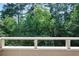 View from balcony overlooking lush trees and greenery at 25309 Plantation Ne Dr # 309, Atlanta, GA 30324