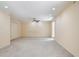 Neutral living room featuring a ceiling fan, recessed lights and closet for storage at 25309 Plantation Ne Dr # 309, Atlanta, GA 30324