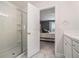 Bathroom with shower and view into bedroom at 2978 Edgemont Ln, Marietta, GA 30008