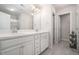 Bright white bathroom featuring double sink vanity at 2978 Edgemont Ln, Marietta, GA 30008